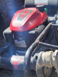 Lawn Mowers And Engines in The Yard